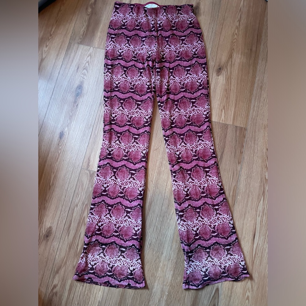 Urban Renewal pink mesh snakeskin print pants